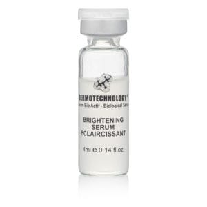 DERMOTECHNOLOGY® Brightening Serum vial, a bioactive serum designed to lighten and even out skin tone.