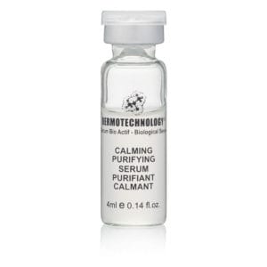 DERMOTECHNOLOGY® Calming Purifying Serum vial, designed to soothe and clarify sensitive, acne-prone skin.