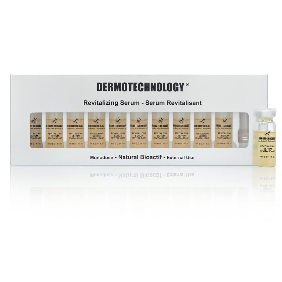Box of DERMOTECHNOLOGY® Revitalizing Serum monodoses, formulated for external use with natural bioactive ingredients.