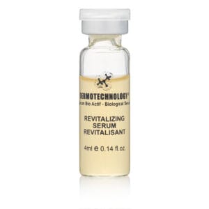 DERMOTECHNOLOGY® Revitalizing Serum vial with bioactive ingredients for anti-aging skincare.