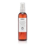 Dermotechnology Bio-Glow Mist in an amber spray bottle for all skin types.