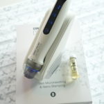 Dermopen professional microneedling device displayed on packaging